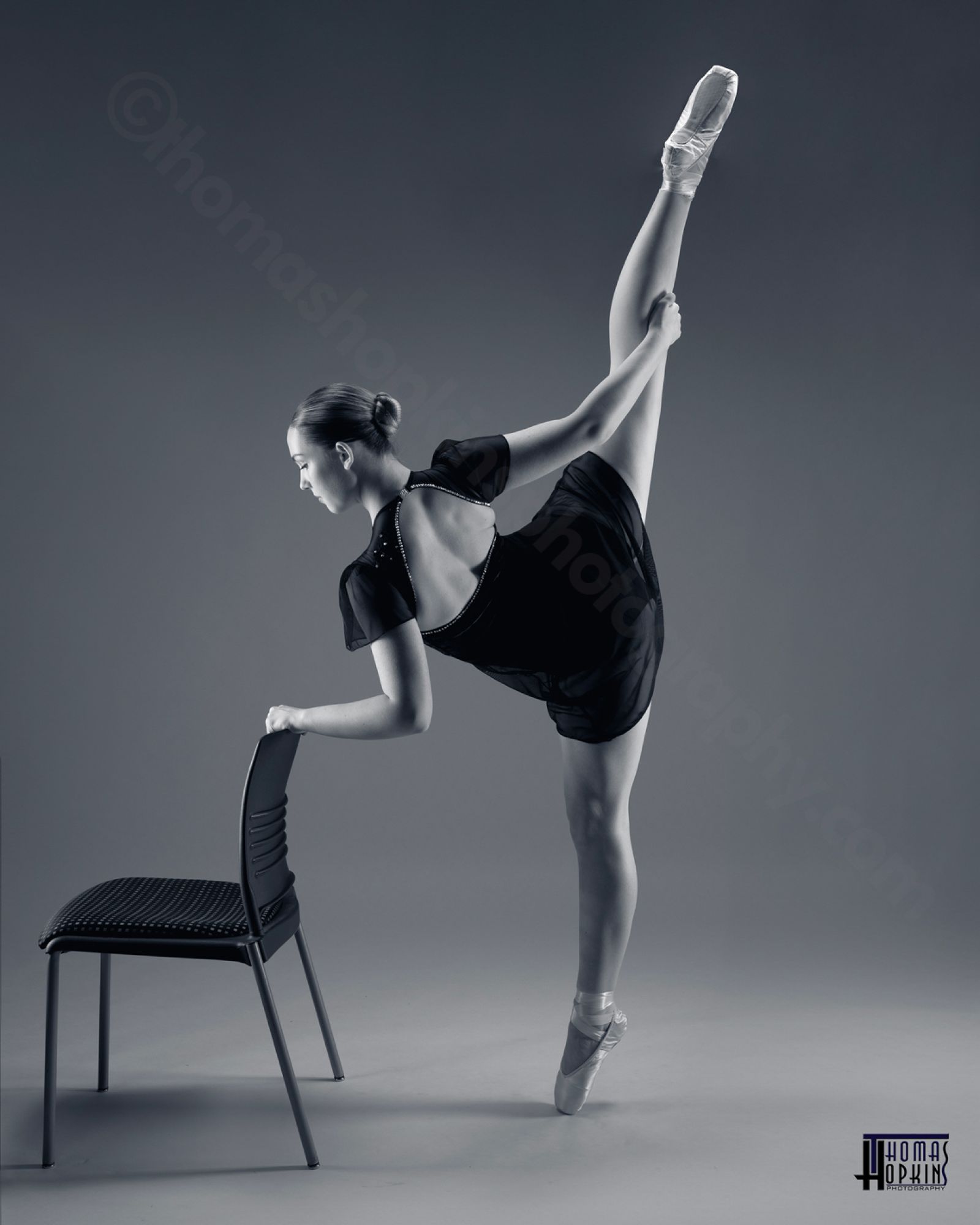 Ballet dancer in a dramatic extended pose, photographed in the studio
