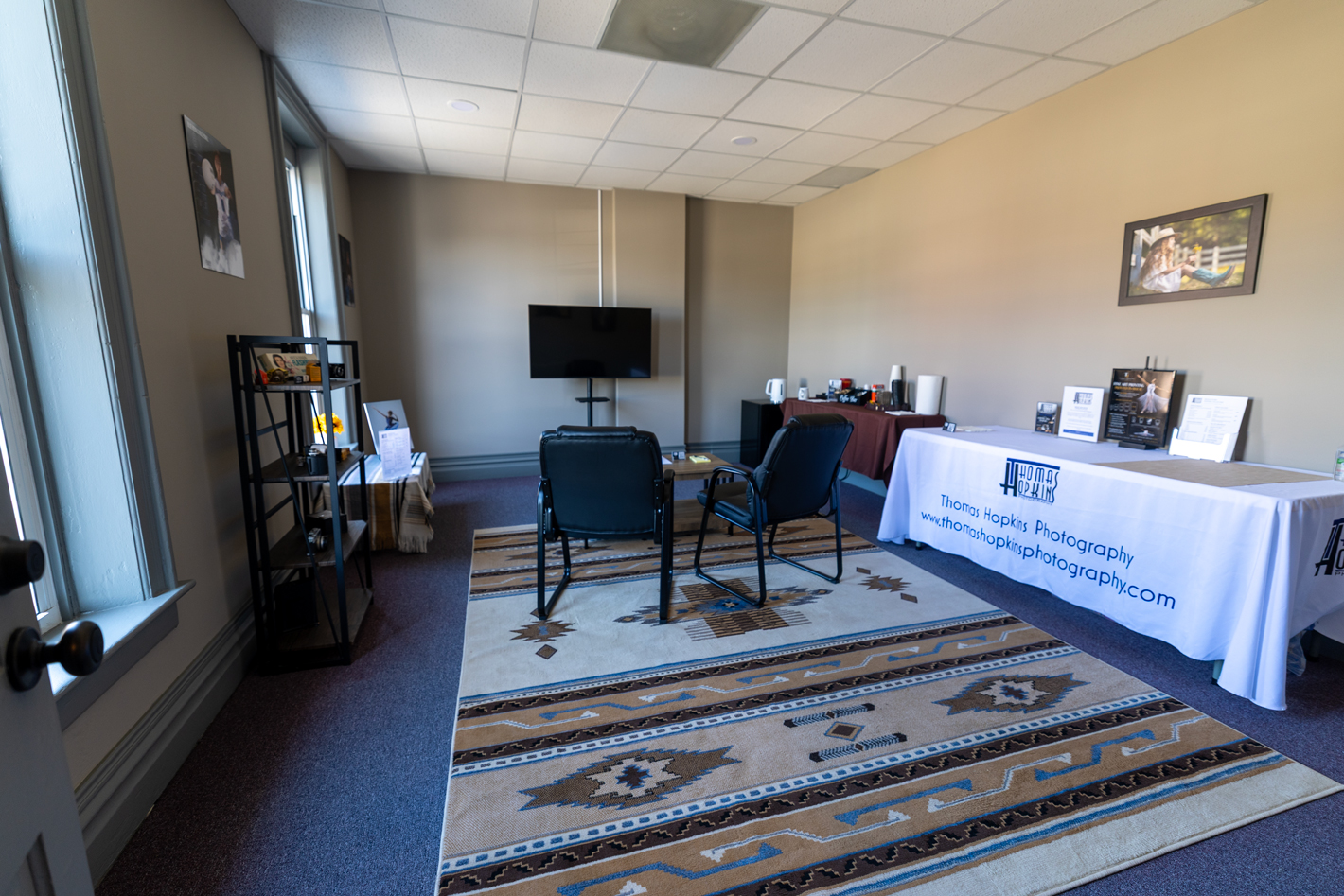 Client lounge with seating and viewing screen